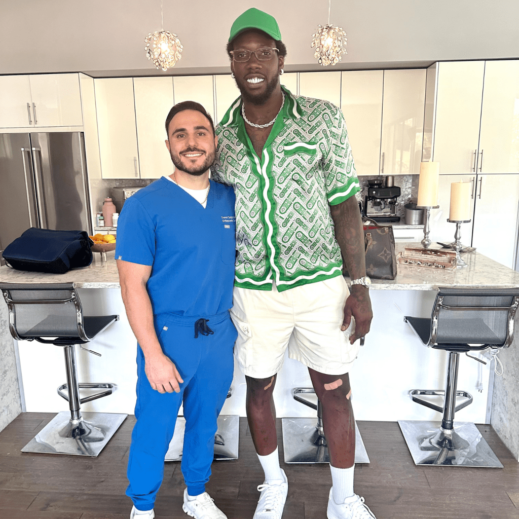 Jason Pierre-Paul with Trevor Saggese, PA-C, at Florida Regenerative